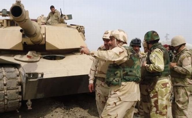 Trupele irakiene au reuşit încercuirea completă a oraşului Tikrit