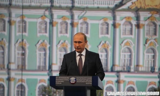 Vladimir Putin: Rusia a evitat o criză profundă, în ciuda sancţiunior legate de conflictul ucrainean