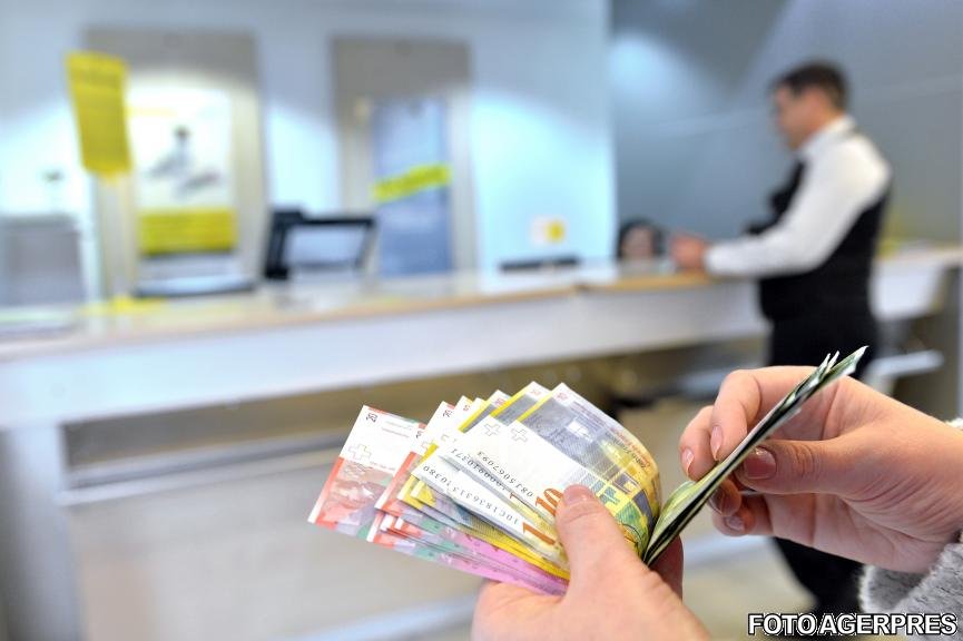 Românii ar putea scăpa de credite, prin lege