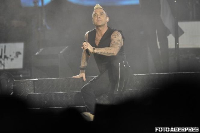 Robbie Williams părăseşte România după un megaconcert