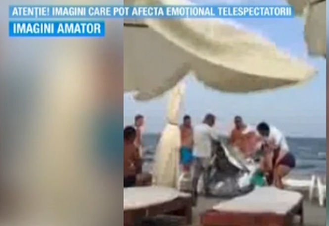 Scandalos! Familie scuipată, înjurată şi bătută pe o plajă din Mamaia