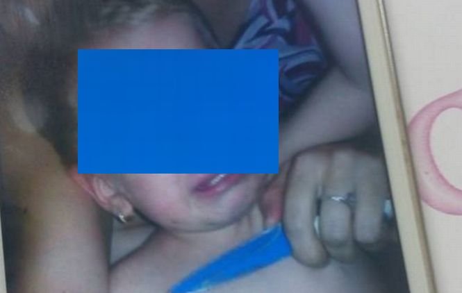 A primit o poză în care fetiţa lui apare cu un cuţit ţinut la gât. Cine se află în spatele ameninţării bolnave