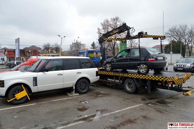 Scandal la Timișoara, după ridicarea abuzivă a unei mașini. Paronul firmei responsabile, reținut după ce a lovit un jandarm cu mașina