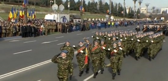 Proud romanians attend National Day military parade