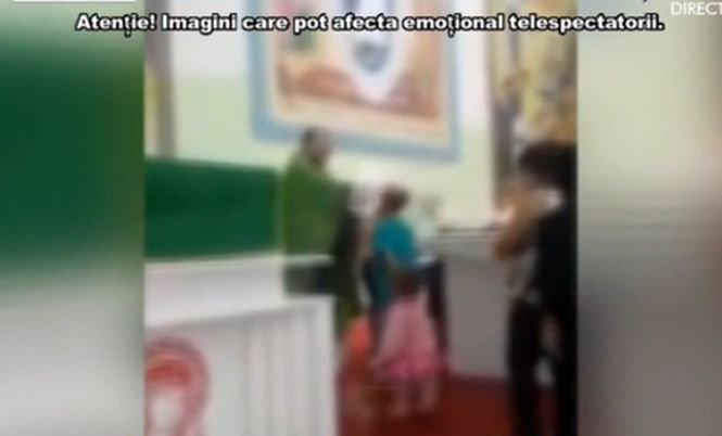 Un nou scandal în Biserică. Preot filmat în timp ce bătea copii în fața altarului