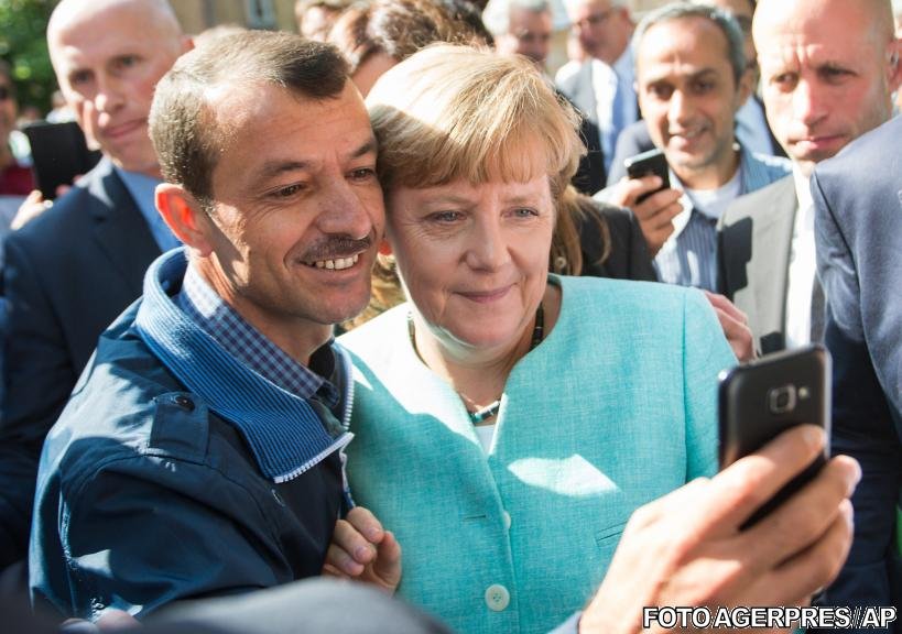 După ce au fost primiți cu îmbrățișări, partidul lui Merkel ia în calcul izolarea refugiaților 