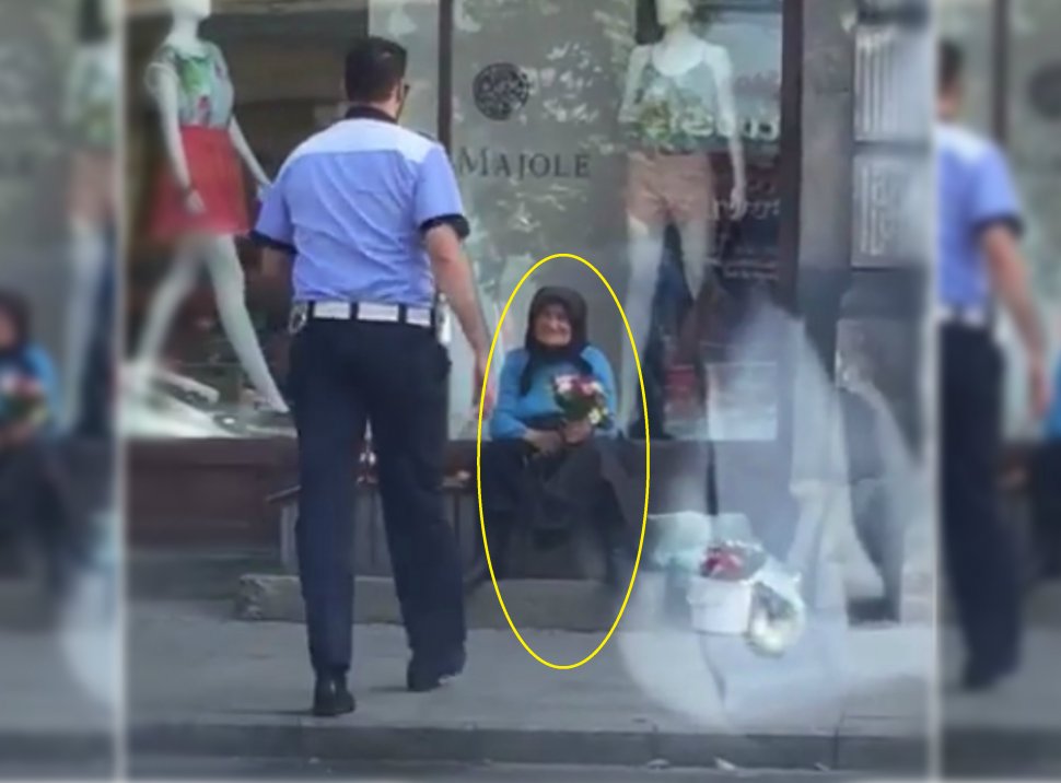 Un polițist se apropie de o bătrânică ce vinde flori la marginea bulevardului. Ce a urmat a stârnit o puternică emoție pe internet - VIDEO 