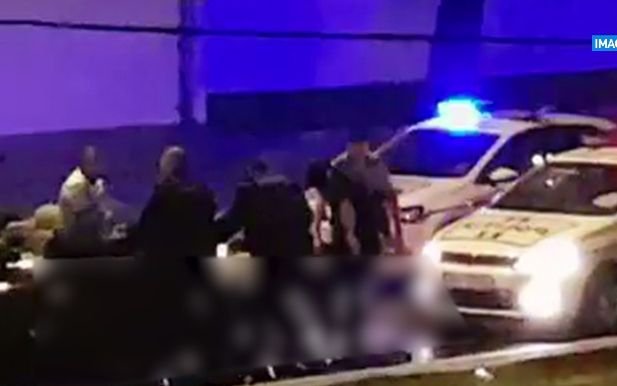 Bătaie pe o stradă din București! Polițiști și jandarmi filmați în timp ce calcă în picioare un șofer băut. Imagini de la fața locului