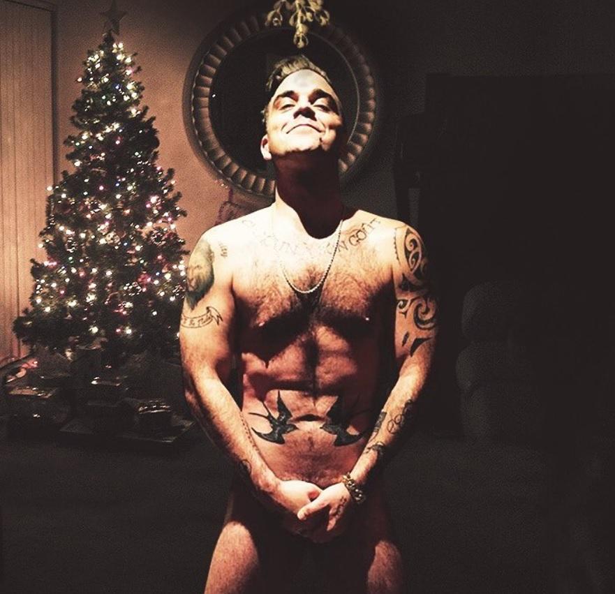 Robbie Williams, gest șocant în ziua de Crăciun. Cum a fost fotografiat 499375