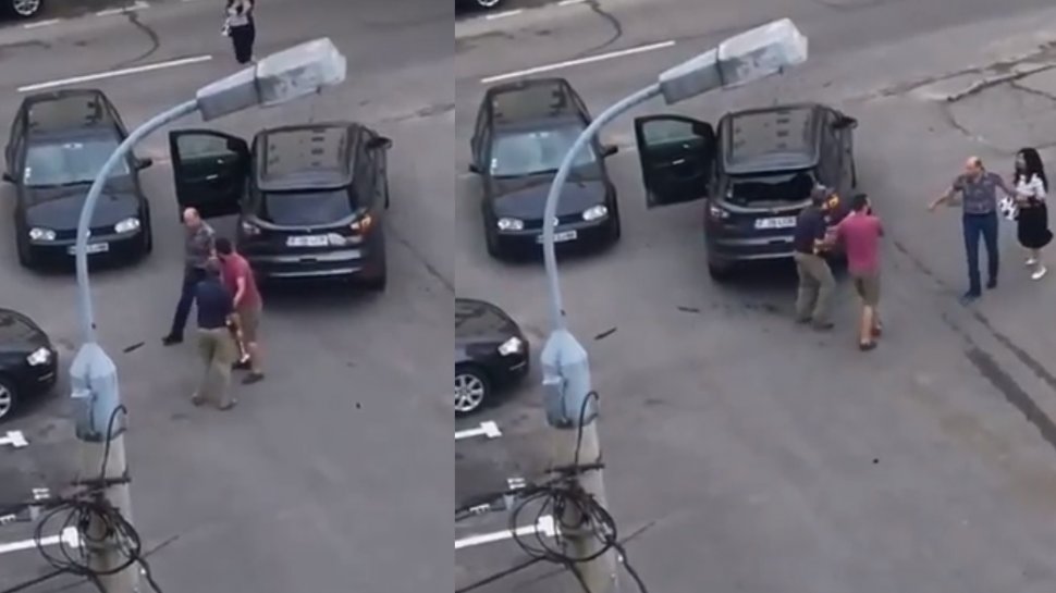 Scandal pe o stradă din Pitești! A smuls o bară de metal din asfalt și a distrus o mașină - VIDEO