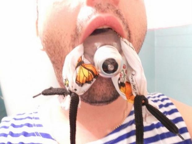 Ce se întâmplă atunci când bagi un bec în gură? Să NU încercaţi aşa ceva acasă! 556076