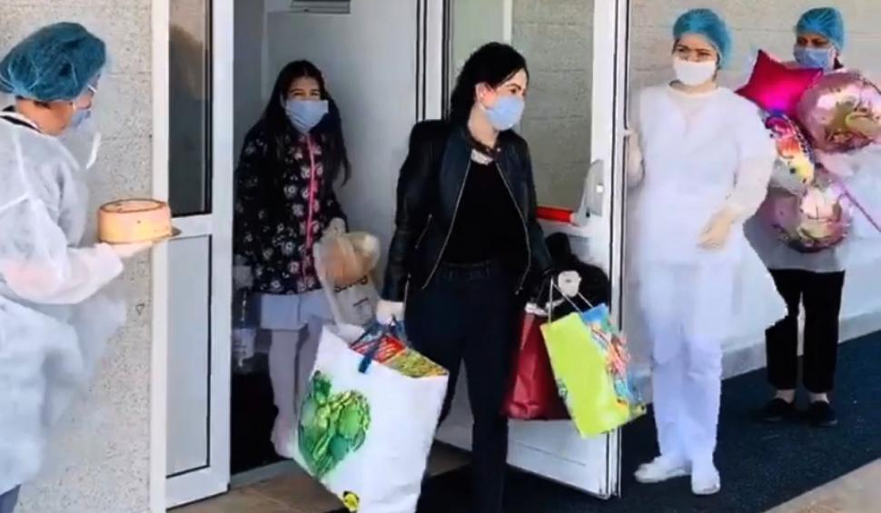 O fetiță ieșită din carantină de ziua ei, așteptată cu tort și baloane de asistentele de la Sanatoriul Techirghiol