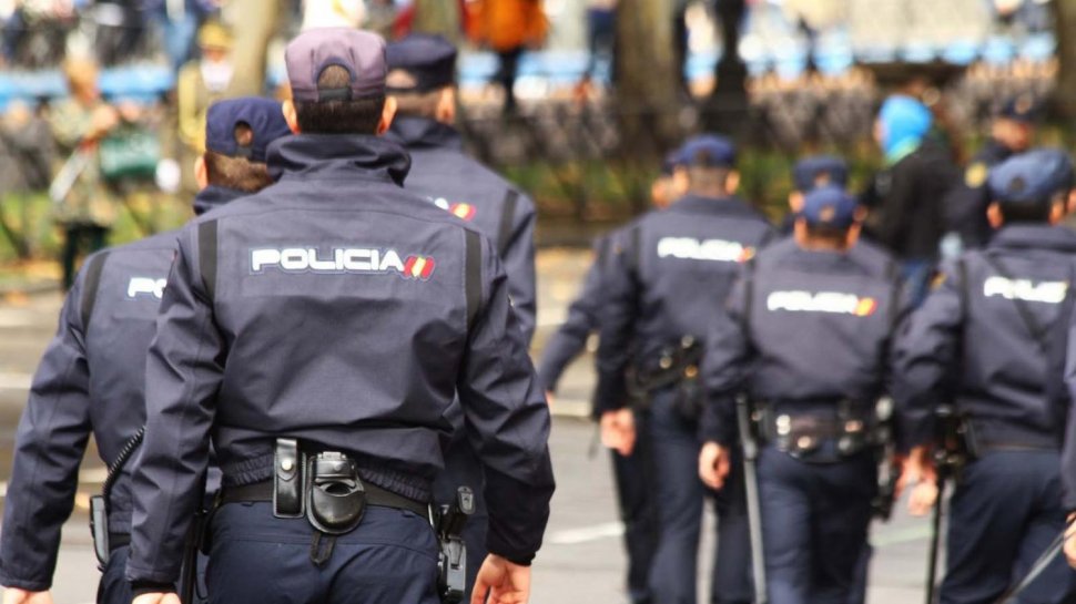 11 români din Spania, arestați pentru trafic cu muncitori agricoli