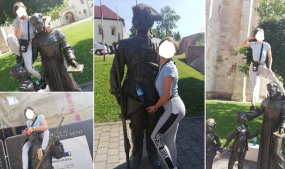 Ce a pățit o turistă din Alba Iulia după ce s-a urcat pe mai multe statui pentru a-și face poze
