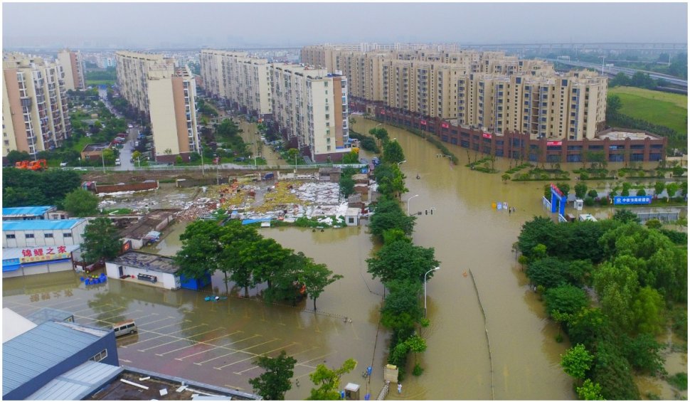 Nou bilanț al inundațiilor din China: 33 de morţi şi 8 dipăruţi