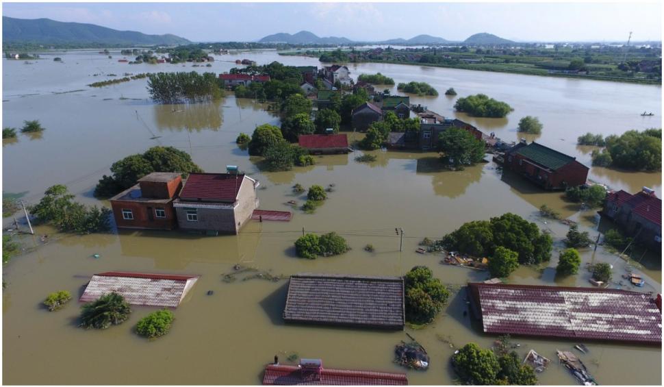 Nou bilanț al inundațiilor din China: 33 de morţi şi 8 dipăruţi 718126