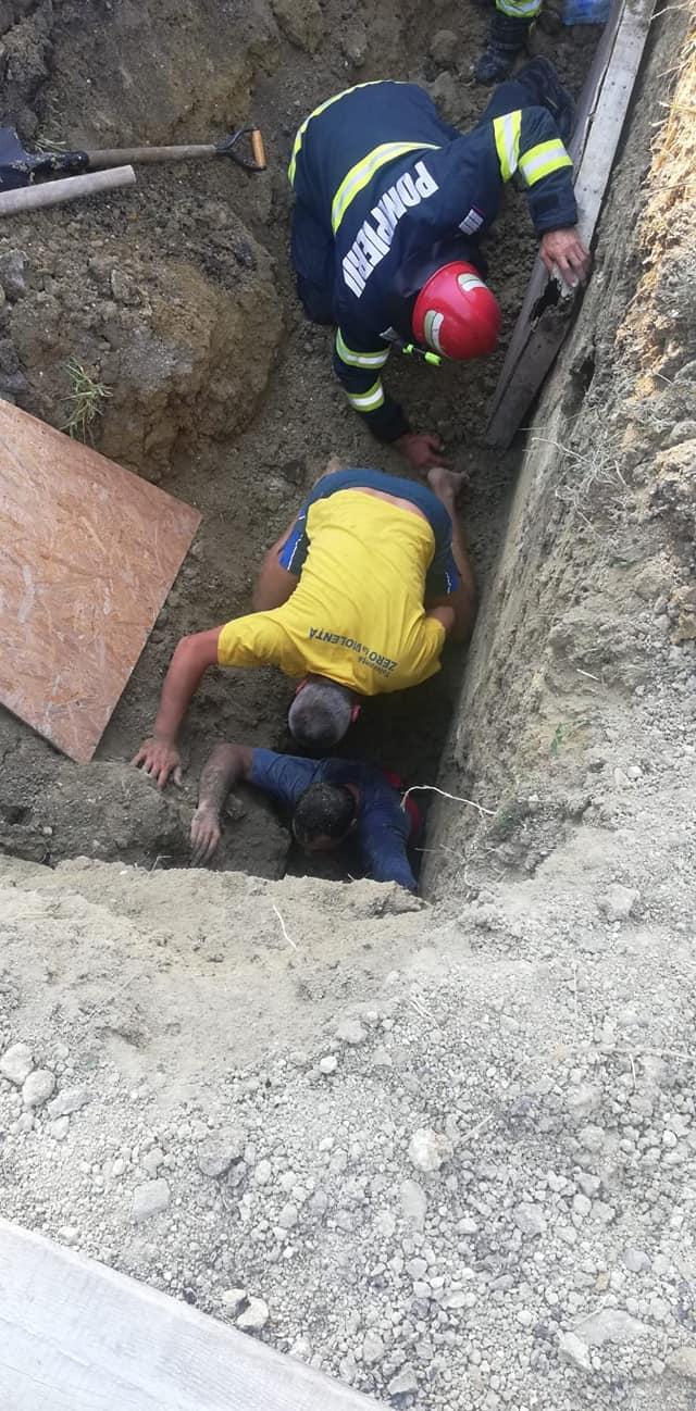 Un polițist aflat în timpul liber a salvat un muncitor prins sub un mal de pământ în Deva 721821