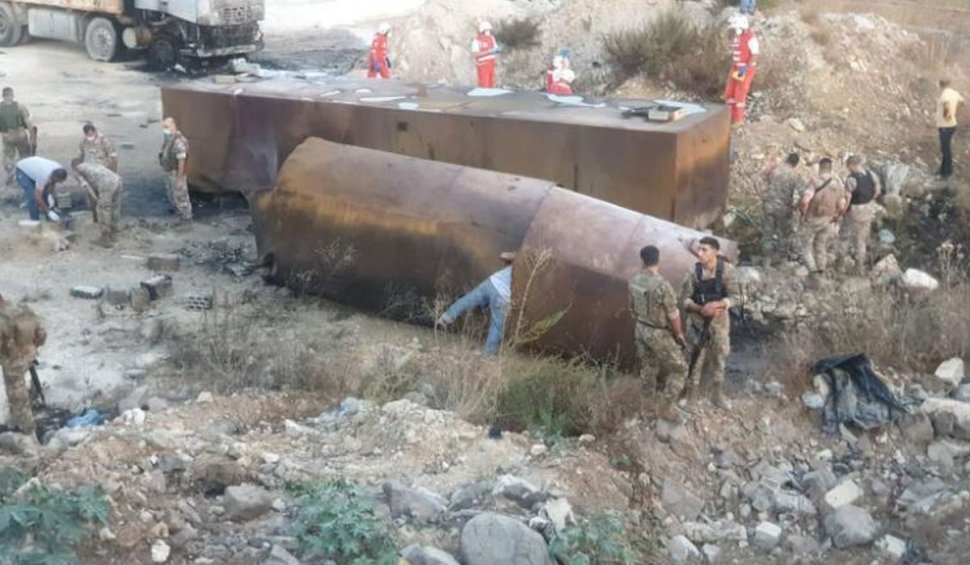 Zeci de oameni au murit după ce a explodat o cisternă din care armata dădea gratis combustibil populației, în Liban