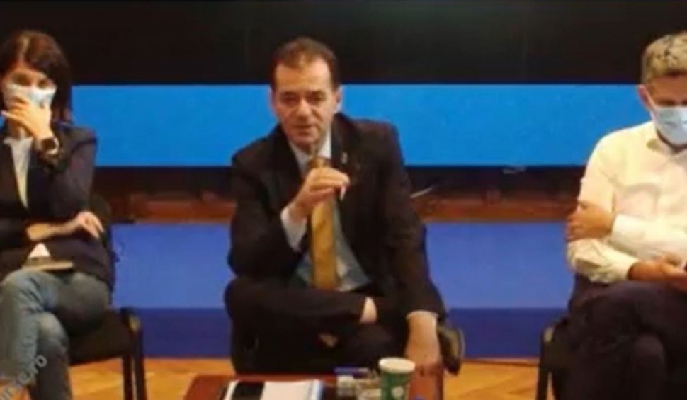 Ludovic Orban sfidează din nou regulile. A fost surprins fumând la ședință, în timp ce colegii lui purtau mască de protecție