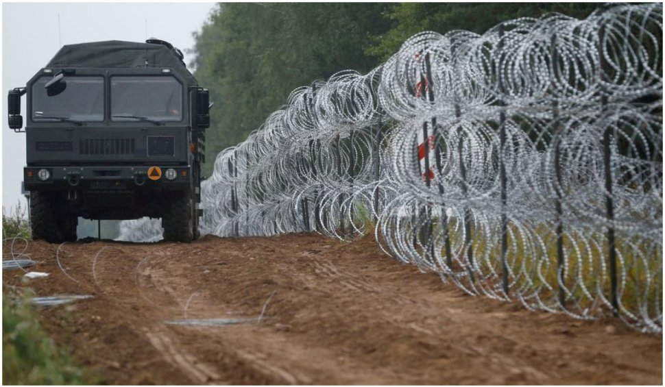Polonia vrea să construiască un gard permanent la frontiera cu Belarus