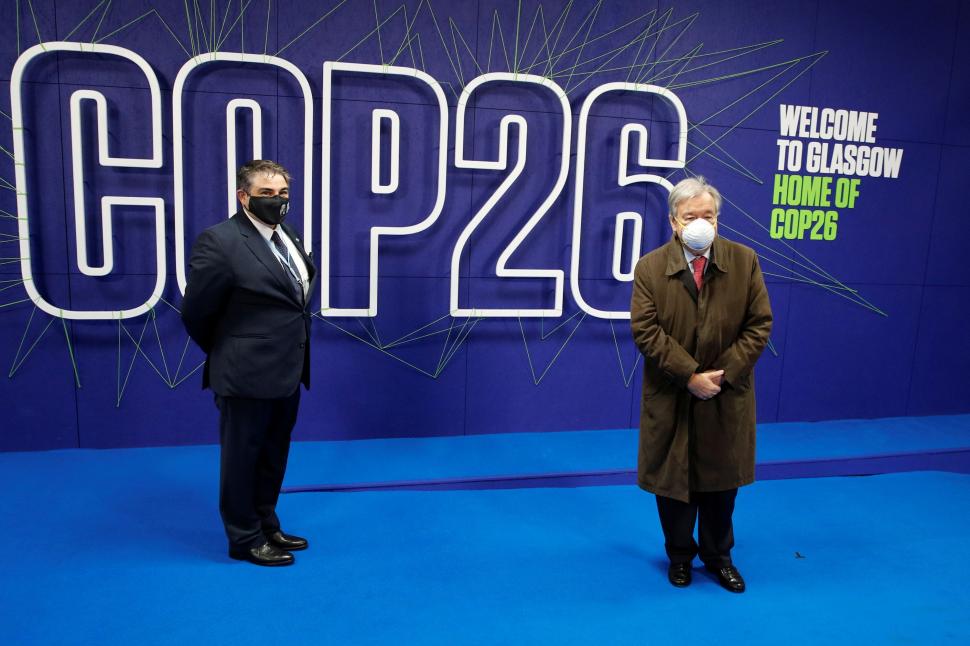 Klaus Iohannis, strângere de mână cu Joe Biden la COP26, unde secretarul general ONU a avertizat: "Ne săpăm singuri groapa!" 733893