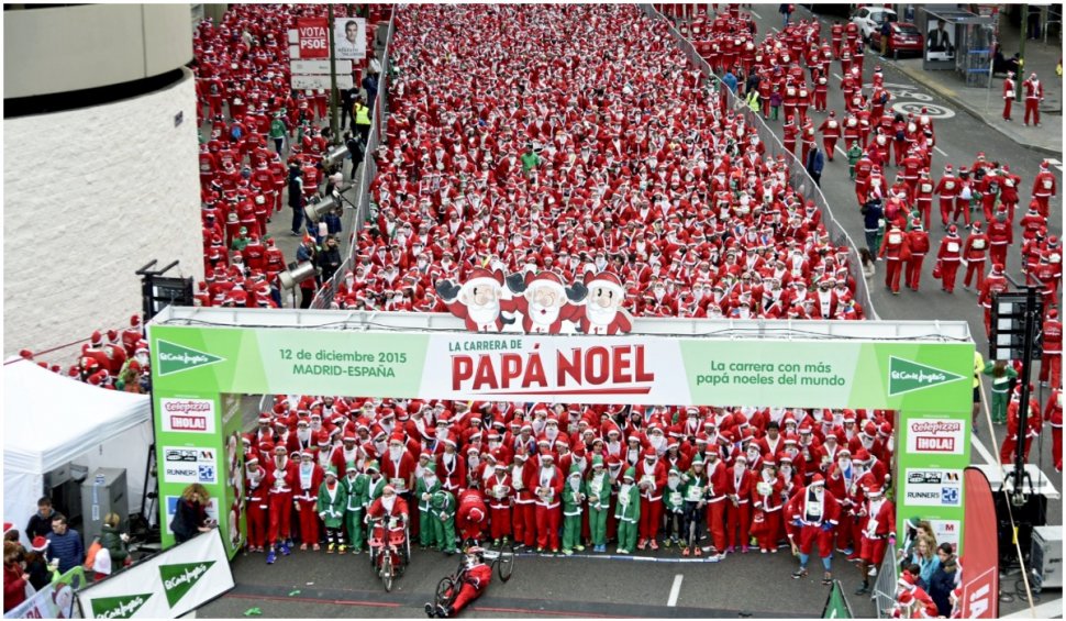 Mii de Moși Crăciuni au alergat în scopuri caritabile la Madrid, în beneficiul celor afectați de erupția La Palma