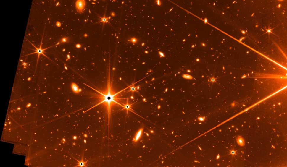 Prima imagine color a Universului, realizată de telescopul James Webb, publicată de NASA ca “teaser”. Când va fi dezvăluită întreaga colecție