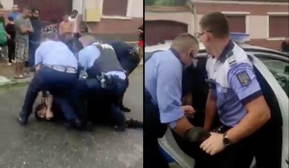 Polițiștii din Orăștie, filmați cum se luptă să bage în mașină un bărbat care a sunat fără motiv la 112: "I-ai rupt dinții din gură la tata meu, că s-o sfădit cu mama"