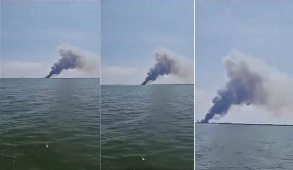 Navă militară rusă, în flăcări, în portul Sevastopol