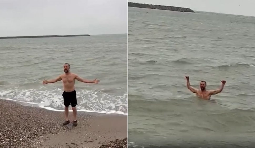 Un iubitor al mării a sfidat temperaturile scăzute şi a făcut baie chiar de Ziua Naţională a României