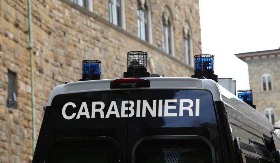 Caz terifiant în Italia. Un român a amenințat că-și va arunca fetița de un an pe geam, după ce și-a bătut soția. A fost oprit cu electroșocuri