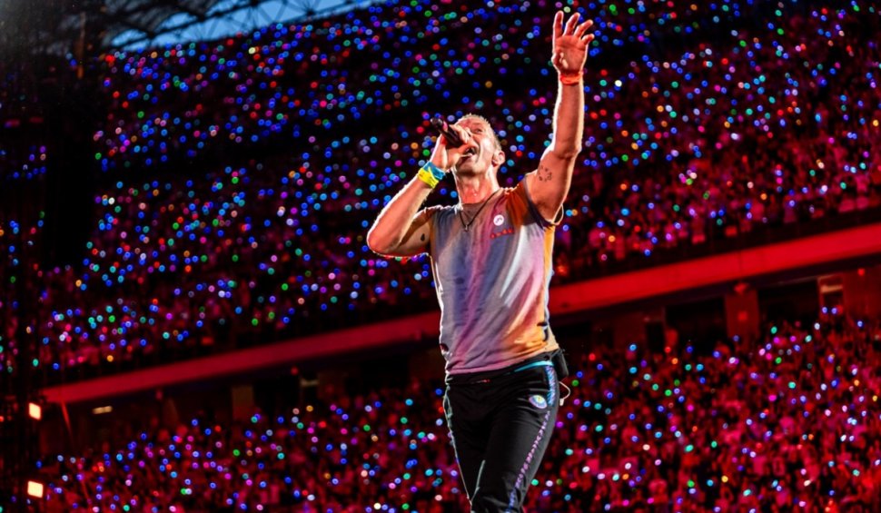 Peste 100.000 de fani la coadă, pentru bilete pre-sale la concertul Coldplay din București, de anul viitor. Prețul tichetelor de acces