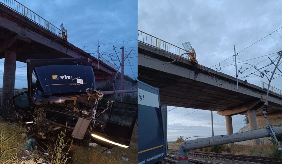 Un TIR a căzut de pe podul de trecere peste calea ferată, pe DN2. Circulația feroviară este oprită