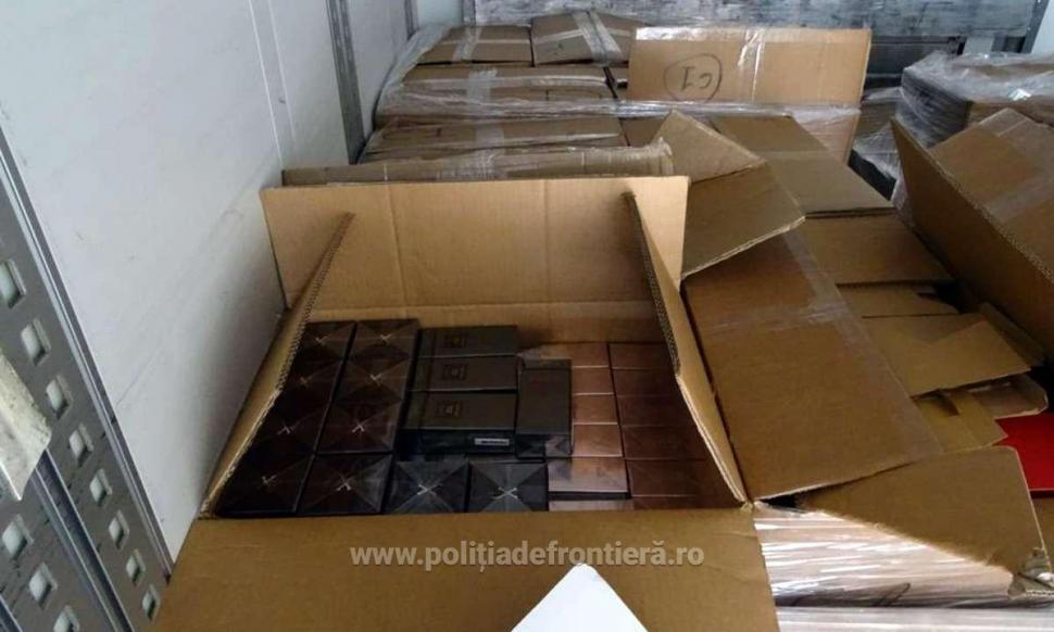 Captură de aproape 4 milioane de lei la Calafat. Parfumuri, genți și haine de lux contrafăcute, descoperite într-un camion 864846
