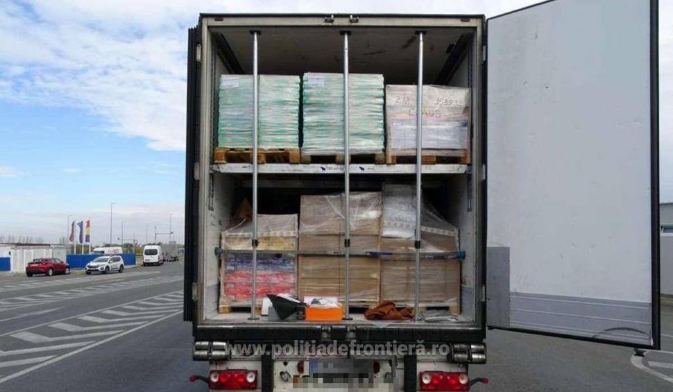 Captură de aproape 4 milioane de lei la Calafat. Parfumuri, genți și haine de lux contrafăcute, descoperite într-un camion 864848