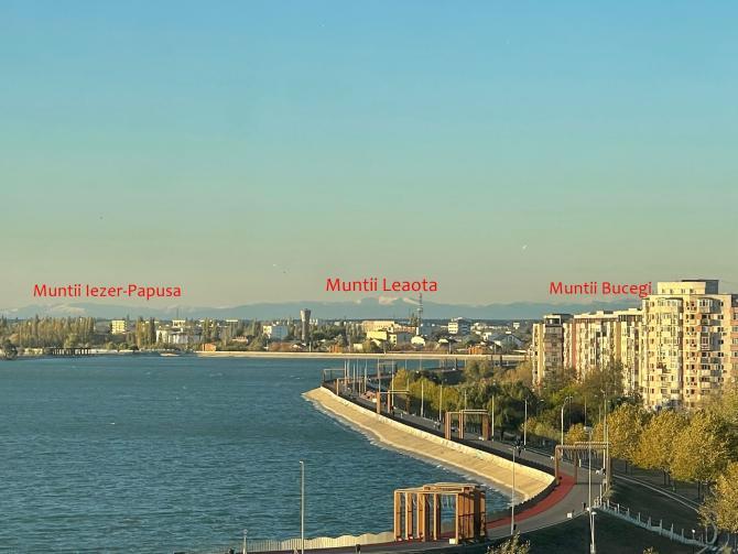 Munții Bucegi, vizibili din București! Zăpada de pe creste, surprinsă în fotografii de locuitorii Capitalei 869037