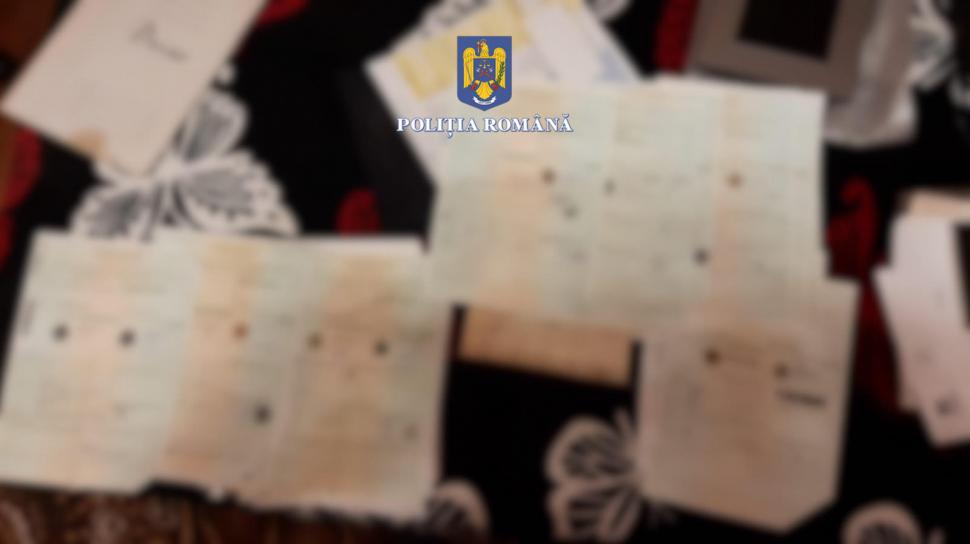 Un bărbat din Sascut şi-a făcut acasă fabrică de permise de conducere, buletine şi acte de înmatriculare 873930