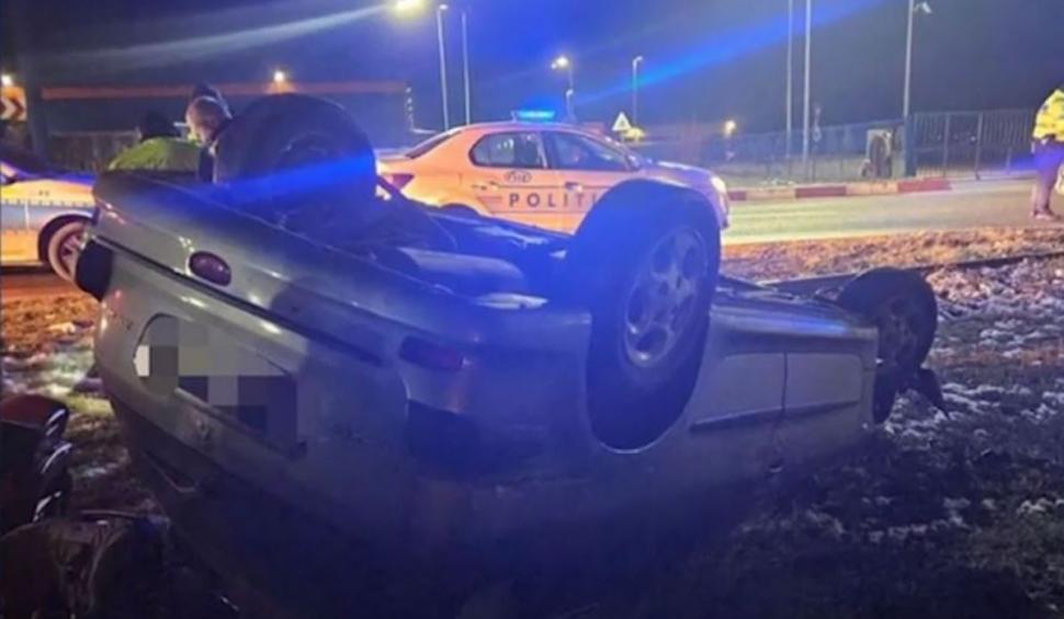 O șoferiță băută și drogată s-a răsturnat cu mașina, în timp ce era urmărită de poliție, în Arad 882374