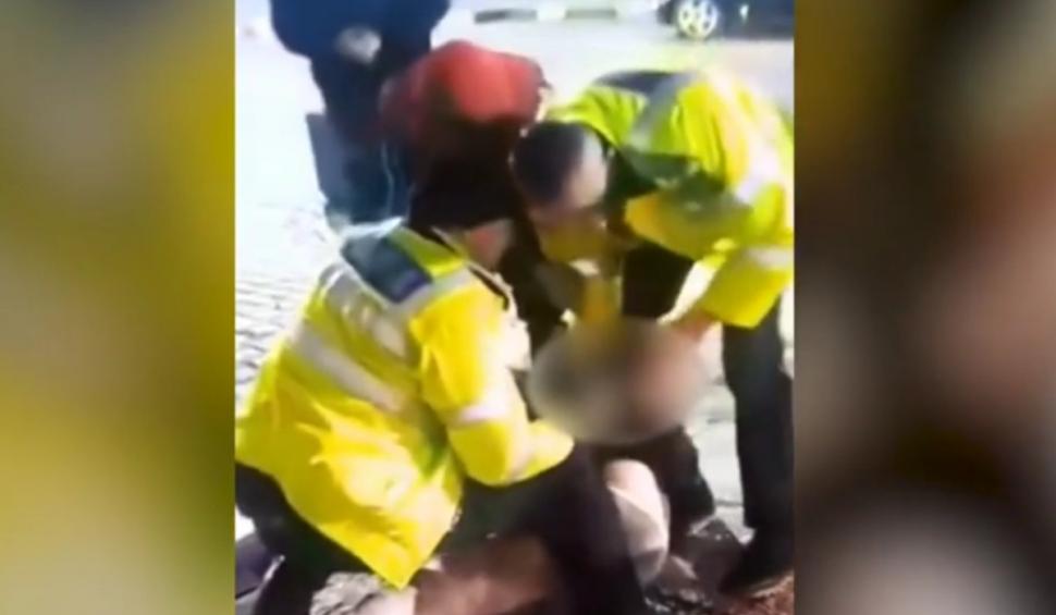 Şoferiţă din Dâmboviţa, bătută şi încătuşată de poliţie în plină stradă 886101