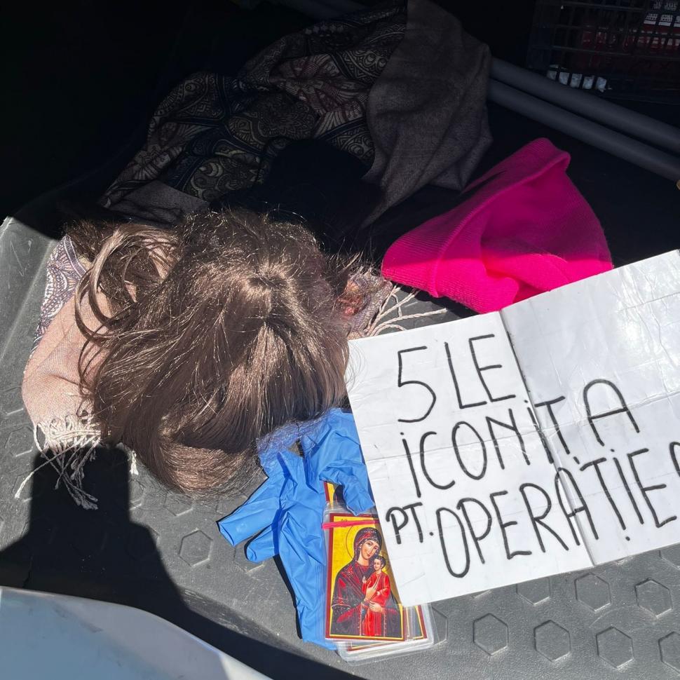 Un bărbat deghizat în femeie cerşea în Bucureşti. Avea maşina alături şi din banii primiţi de la trecători îşi plătea chiria 917226