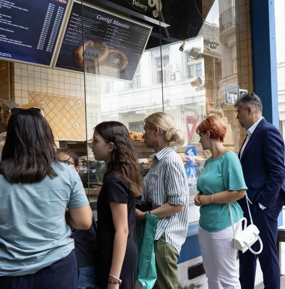 Ciolacu stă la coadă la covrigi, după deep fake-ul viral care îi parodia pe liderii partidelor: „Umorul românilor este incredibil” 919743