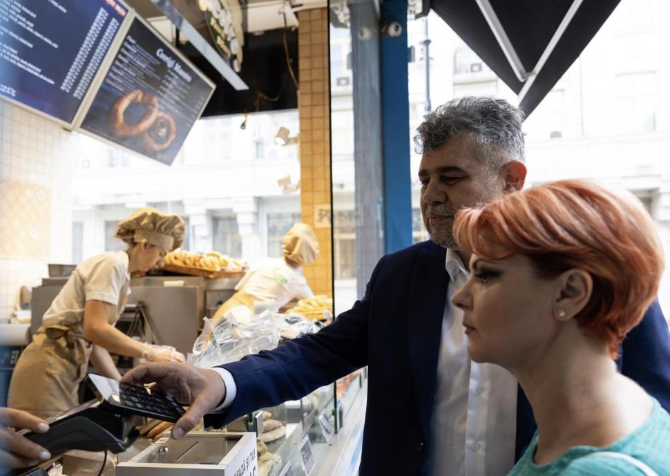 Ciolacu stă la coadă la covrigi, după deep fake-ul viral care îi parodia pe liderii partidelor: „Umorul românilor este incredibil” 919744