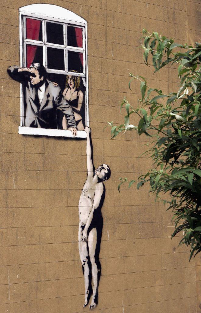 Una dintre picturile celebre ale lui Banksy va fi vândută împreună cu clădirea din Bristol pe care a fost pictată 938034