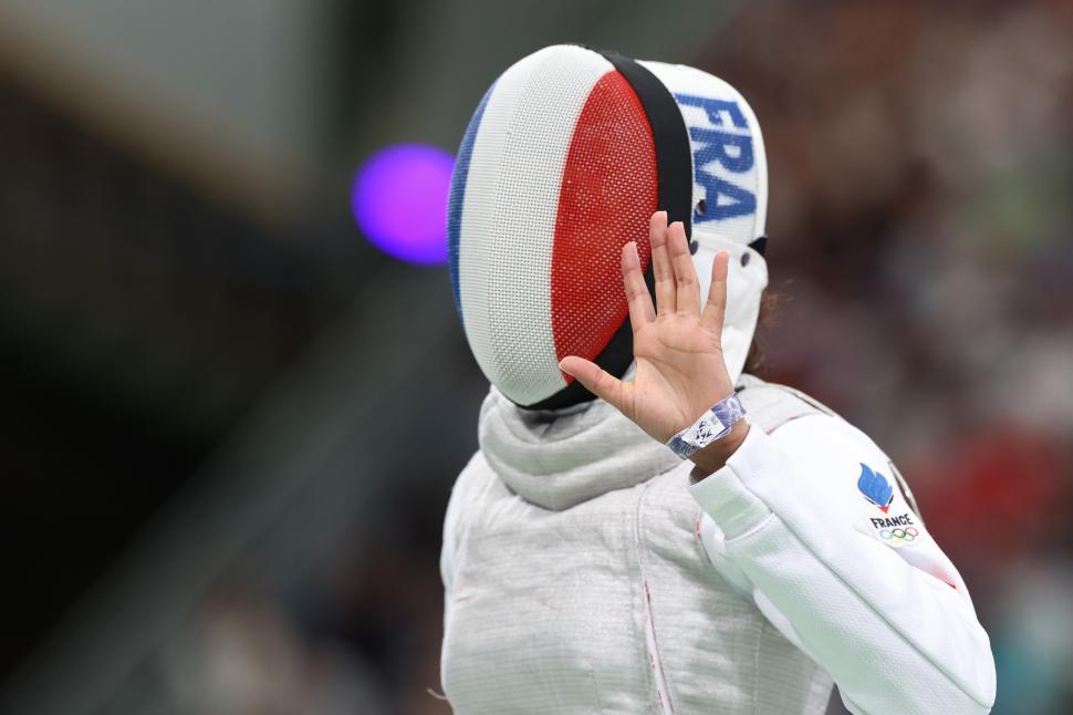 O sportivă a scăpat de acuzația de dopaj după ce a convins instanța că de vină sunt săruturile cu iubitul 987712