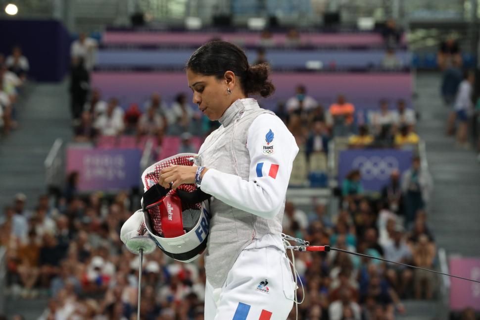 O sportivă a scăpat de acuzația de dopaj după ce a convins instanța că de vină sunt săruturile cu iubitul 987714