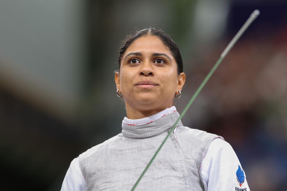 O sportivă a scăpat de acuzația de dopaj după ce a convins instanța că de vină sunt săruturile cu iubitul 987715