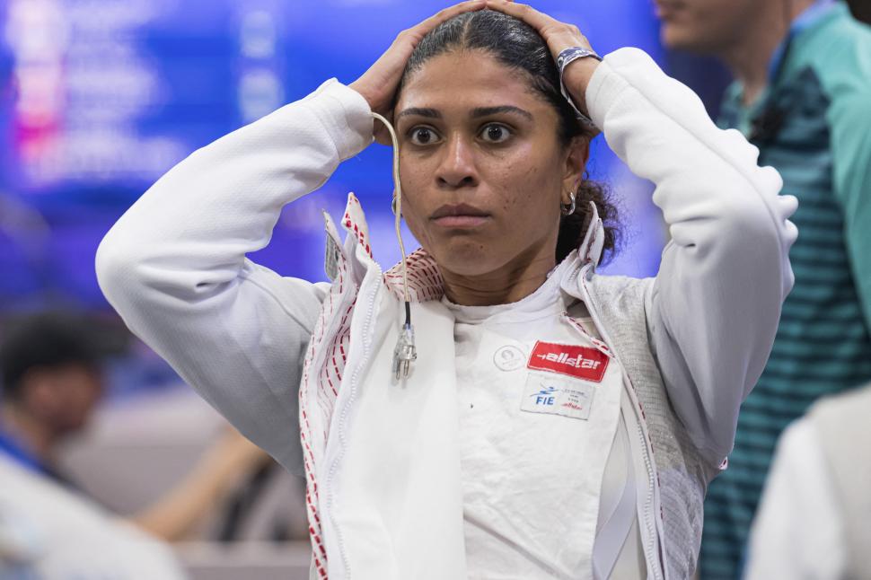 O sportivă a scăpat de acuzația de dopaj după ce a convins instanța că de vină sunt săruturile cu iubitul 987716