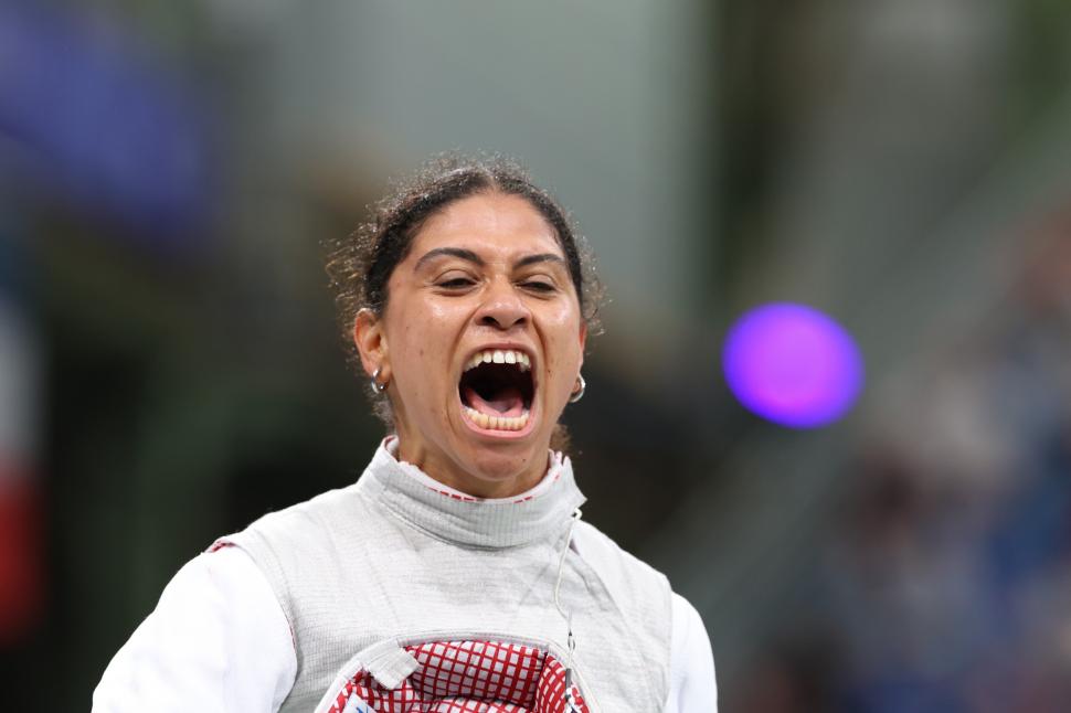 O sportivă a scăpat de acuzația de dopaj după ce a convins instanța că de vină sunt săruturile cu iubitul 987717