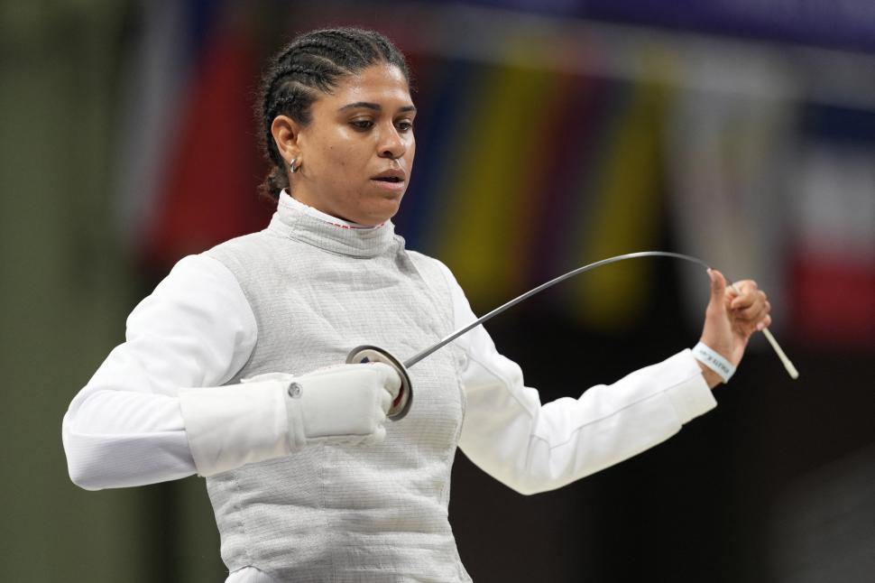 O sportivă a scăpat de acuzația de dopaj după ce a convins instanța că de vină sunt săruturile cu iubitul 987752