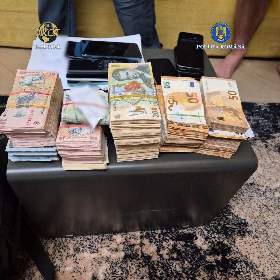 Români, implicați într-o rețea de asasini la comandă. Gruparea acționa pe Dark Web. Ce s-a găsit la percheziții în București și Vâlcea 1040565